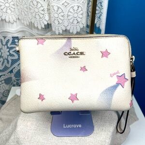 Coach Pink Star Print Cream Wristlet Clutch